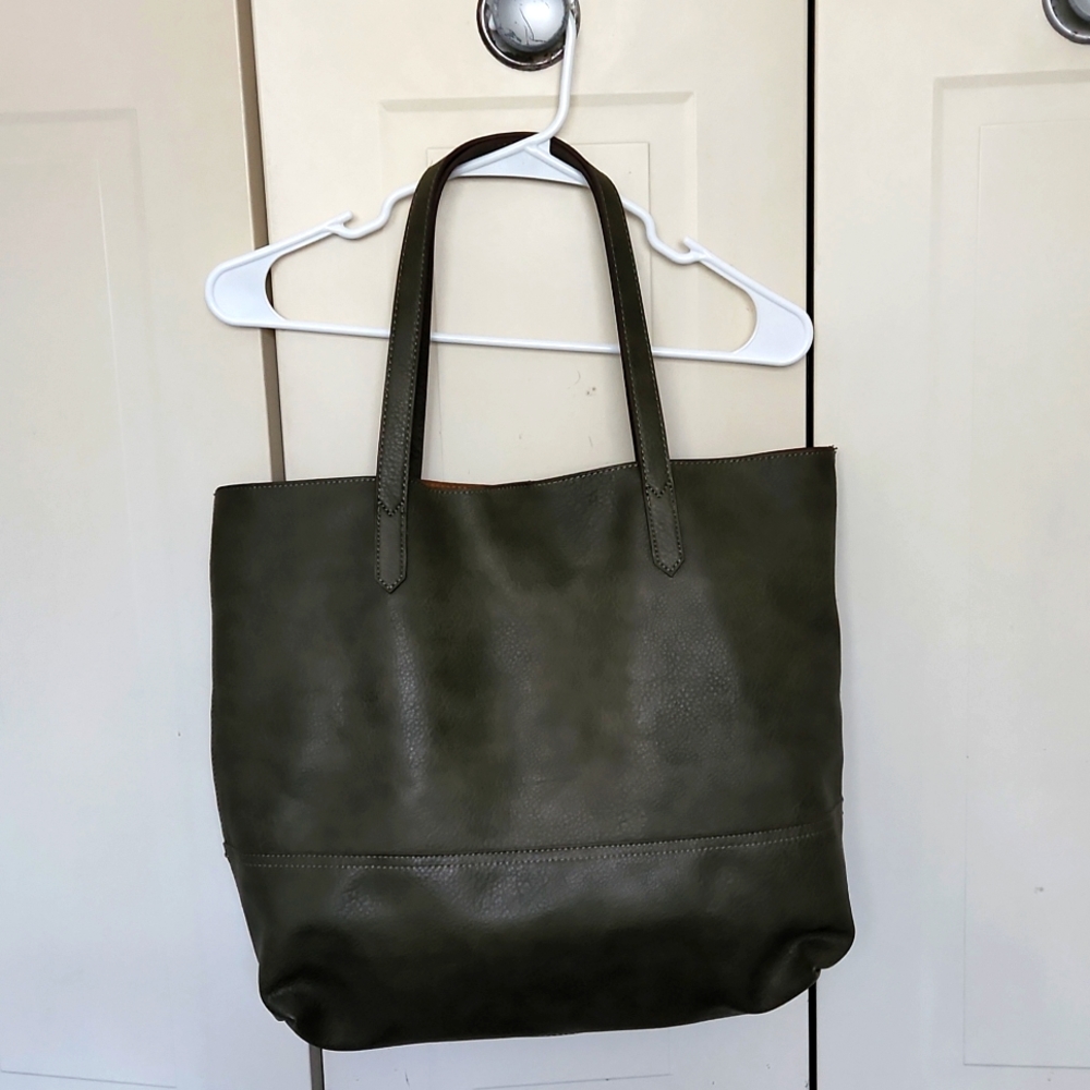 Green shoulder bag with brown suede interior with attached inside smaller bag